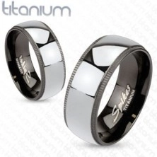 Titanium band of silver color with black decorative border