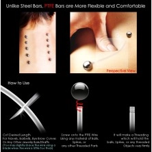 Flexible body piercing - transparent barbell with glossy balls of black colour