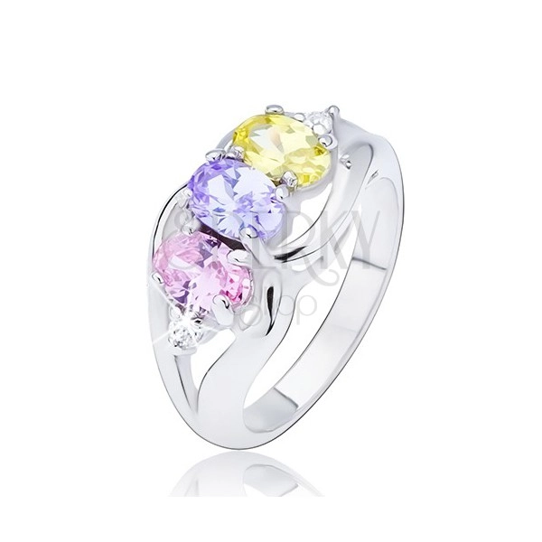Glossy ring in silver colour, three colourful oval zircons between waves