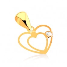 Pendant made of yellow 9K gold - fine double outline of heart, clear zircon