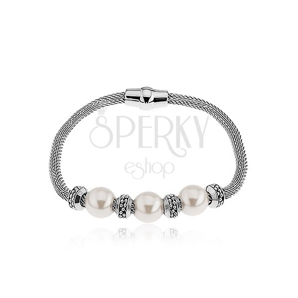 Wrist bracelet made of steel, pearly beads, circles, silver colour