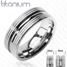 Titanium band with shiny stipe between jagged edges