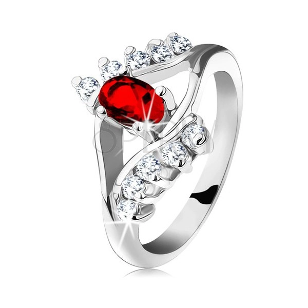Glistening ring in silver hue, red cut oval, clear zircons
