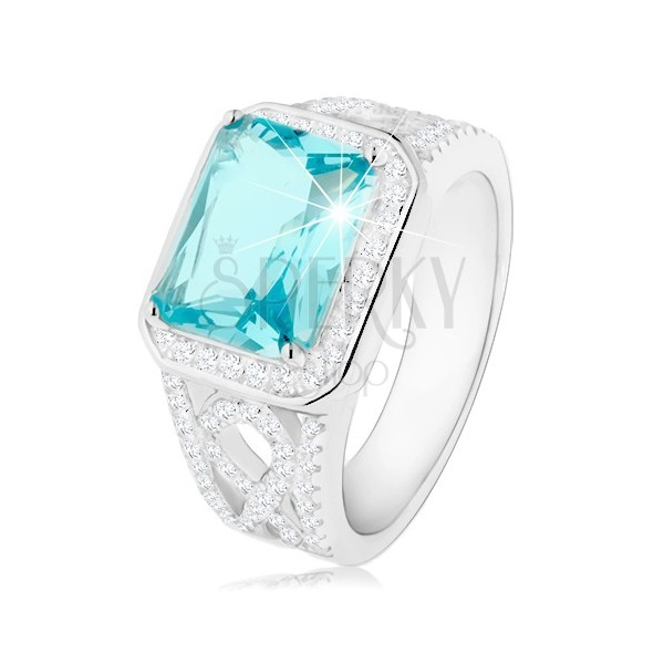 925 silver ring, shoulders with ornament, light blue zircon, clear border