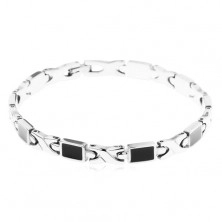 Steel bracelet, X links and oblongs decorated with shiny black glaze