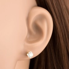 Earrings made of yellow 14K gold - clear round zircon in mount, 5 mm
