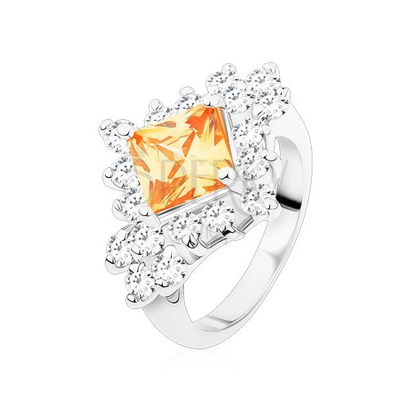 Ring in silver colour, light orange square zircon, round clear zircons