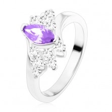 Ring in silver colour, diagonal lines of clear zircons, violet cut grain