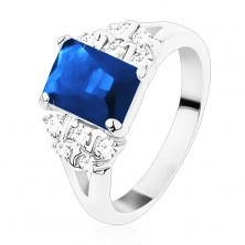 Ring in silver hue, dark blue zircon oblong, clear zircons