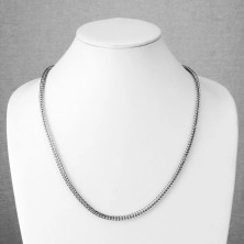 Steel angular chain in silver colour, densely joined shiny links