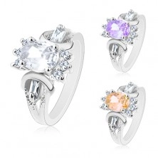 Ring in silver colour, cut coloured oval, round and oblong clear zircons