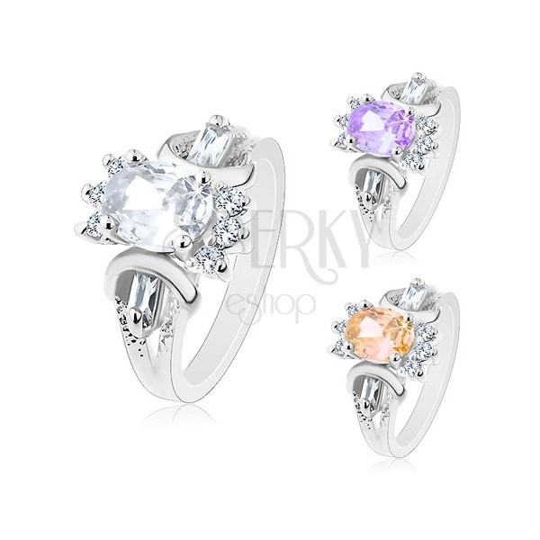 Ring in silver colour, cut coloured oval, round and oblong clear zircons
