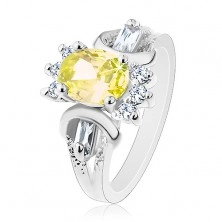 Ring in silver hue, cut coloured oval, round and oblong clear zircons