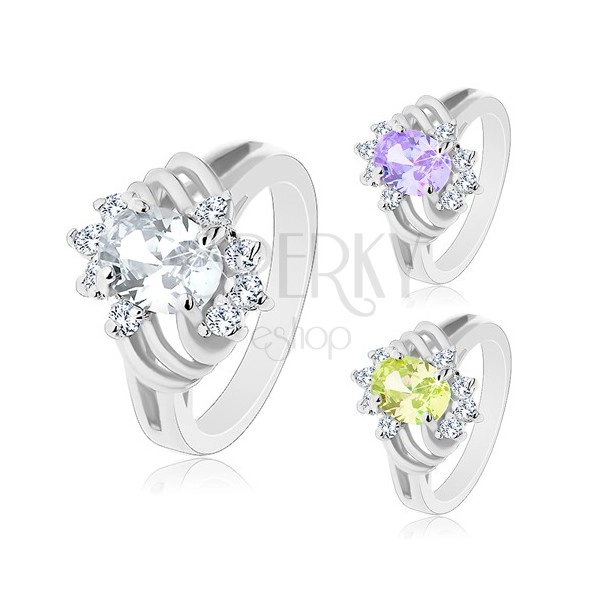 Ring in silver colour, cut coloured oval, thin arcs and clear zircons
