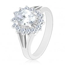 Ring with split shoulders, oval zircon flower in clear colour