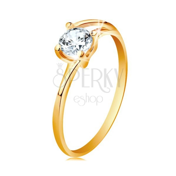 Ring made of yellow 14K gold - thin divided lines of shoulders, sparkly clear zircon