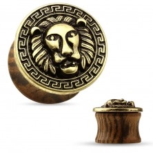 Saddle ear plug made of wood in dark brown colour, patinated lion's head