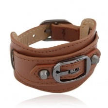 Brown wide bracelet made of synthetic leather, shiny black buckle and two rivets