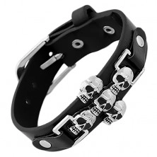 Leatherette black bracelet, four small steel skulls joined in cross