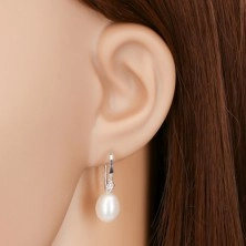 Earrings made of white 14K gold - white oval pearl and clear zircon on hook