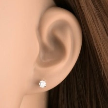 Earrings made of white 14K gold - clear zircon gripped with six prongs, 4 mm