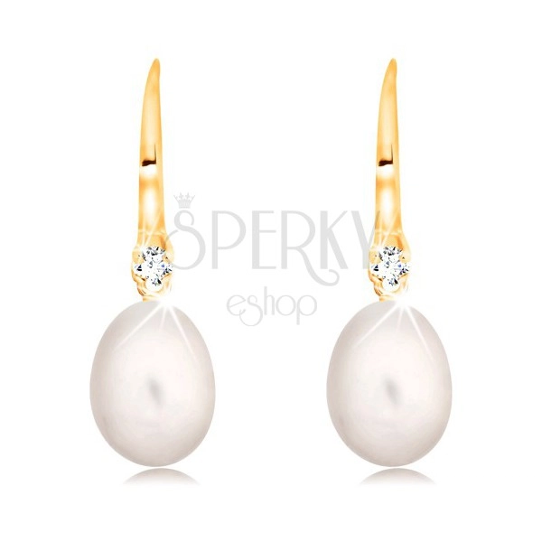 Earrings made of yellow 14K gold - white oval pearl and clear zircon on hook