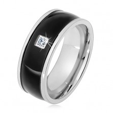 Steel ring in silver colour, black protruding strip with clear zircon