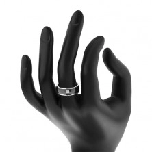 Steel ring in silver colour, black protruding strip with clear zircon