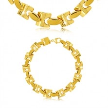 Steel bracelet in gold hue, shiny chain composed of angular links