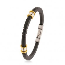 Black rubber bracelet with notches, steel beads in silver and gold colour