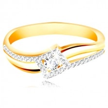Ring of 14K gold - curved and split shoulders, circular zircon in a rhombus