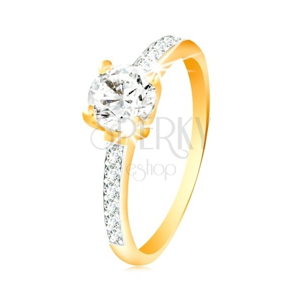 14K gold ring - clear zircon in a mount, zircon lines on the shoulders