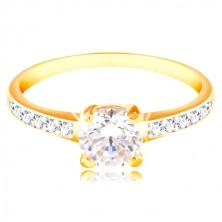 14K gold ring - clear zircon in a mount, zircon lines on the shoulders