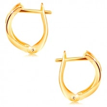 Yellow 14K gold earrings - shiny surface with refined facettes