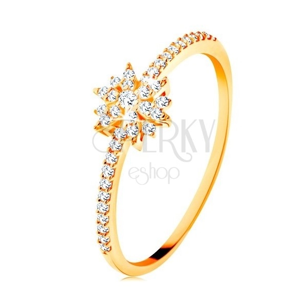 Ring made of yellow 9K gold - sparkly flower composed of clear zircons, glossy shoulders