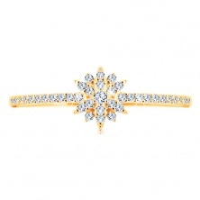 Ring made of yellow 9K gold - sparkly flower composed of clear zircons, glossy shoulders