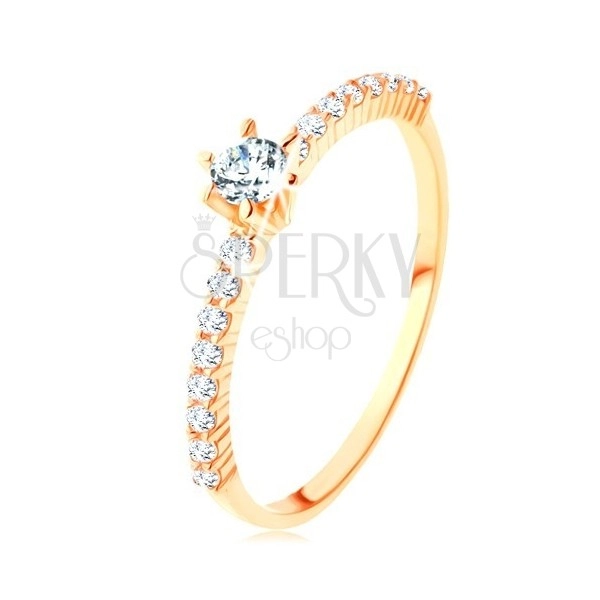 Ring made of yellow 9K gold - clear zircon lines, protruding round zircon