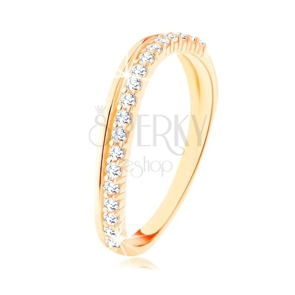 Ring made of yellow 9K gold - smooth and clear zircon wavy line