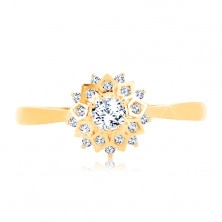375 gold ring - lustrous sun decorated with round clear zircons