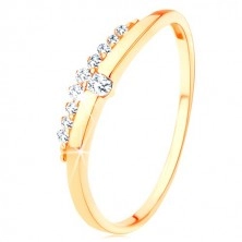 Ring in yellow 9K gold - smooth wave with clear zircon, zircon line