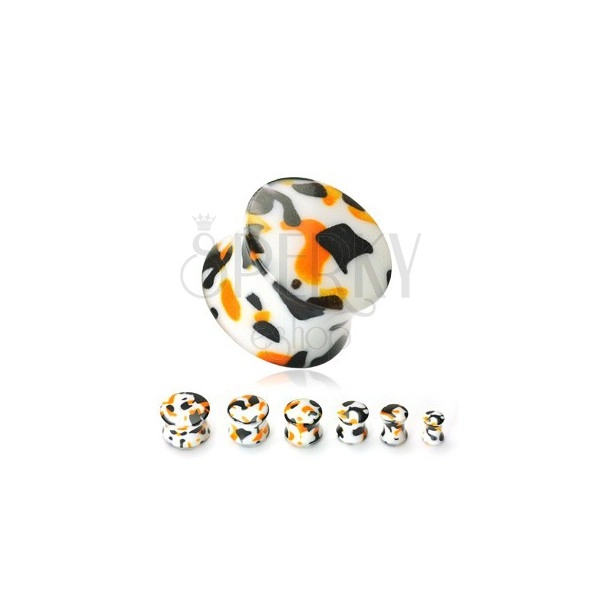 White ear plug with black and orange spots