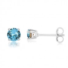 Studs - round zircon of sky-blue colour, square mount, 925 silver