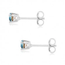 Studs - round zircon of sky-blue colour, square mount, 925 silver