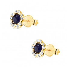Earrings made of 14K yellow gold – flower with a round sapphire, clear zircons, studs