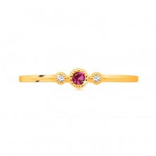 Diamond ring in 14K yellow gold – ruby in a bezel, clear brilliants, tiny beads