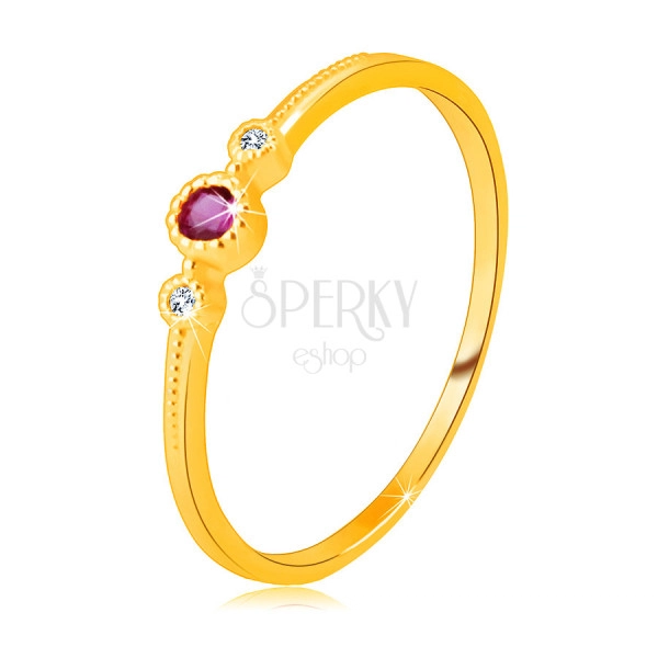 Diamond ring in 14K yellow gold – ruby in a bezel, clear brilliants, tiny beads