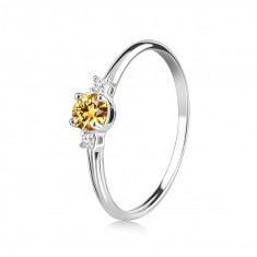 14K White gold ring – a round citrine with two zircons on sides