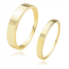 Diamond bands in 585 yellow gold - transverse cutout with clear brilliants