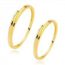 Bands in 585 yellow gold - split shoulders, clear zircon