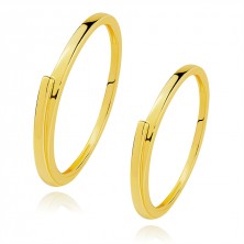 Slim bands in 14K yellow gold - extended shoulder, smooth surface